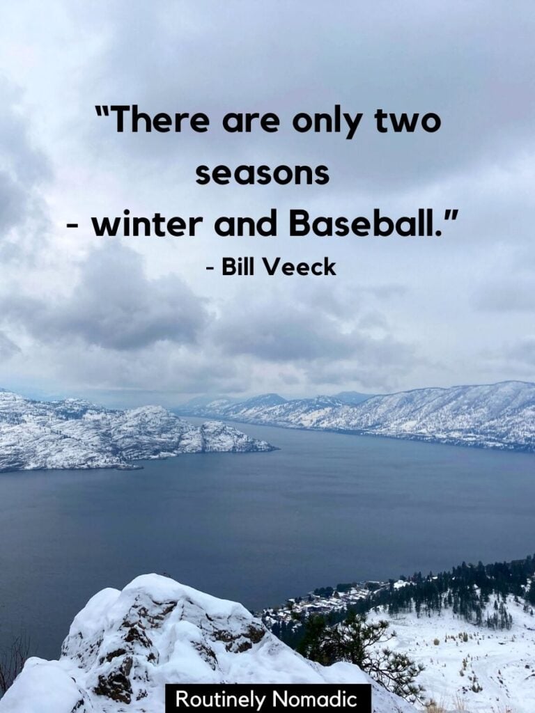 Snowy hills around a lake with funny winter quotes for Instagram by Bill Veeck