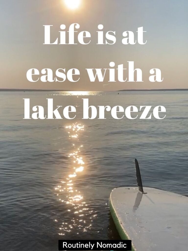 Paddleboard on beach with funny quotes about lake life